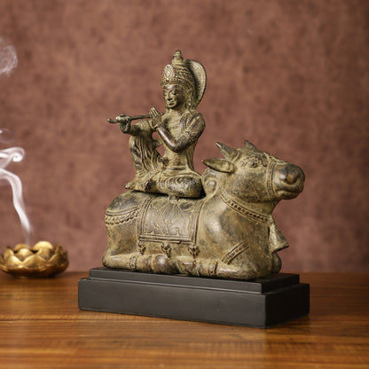 Indonesian Bronze Lord Krishna Sitting on Cow Sculpture | Height: 10 inch