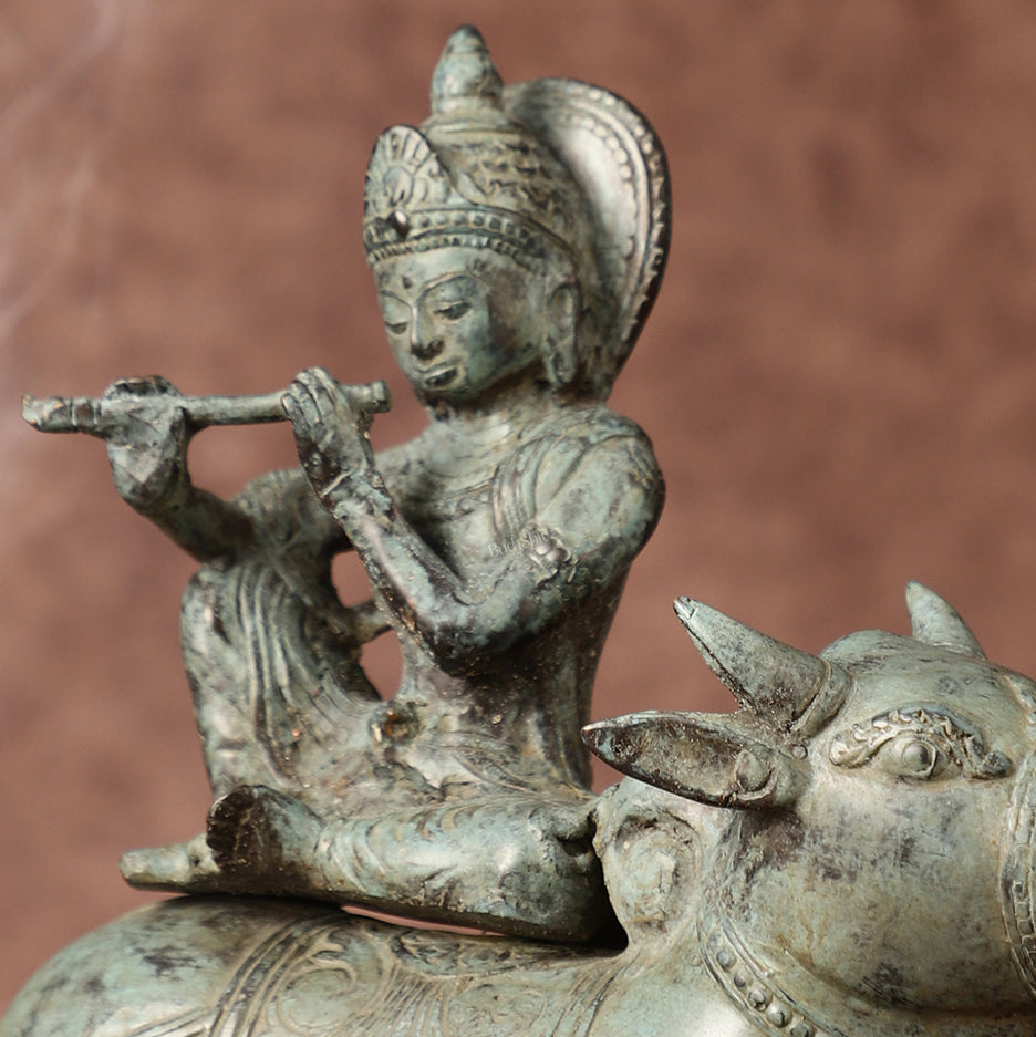 Indonesian Bronze Lord Krishna Sitting on Cow Sculpture | Height: 9 inch