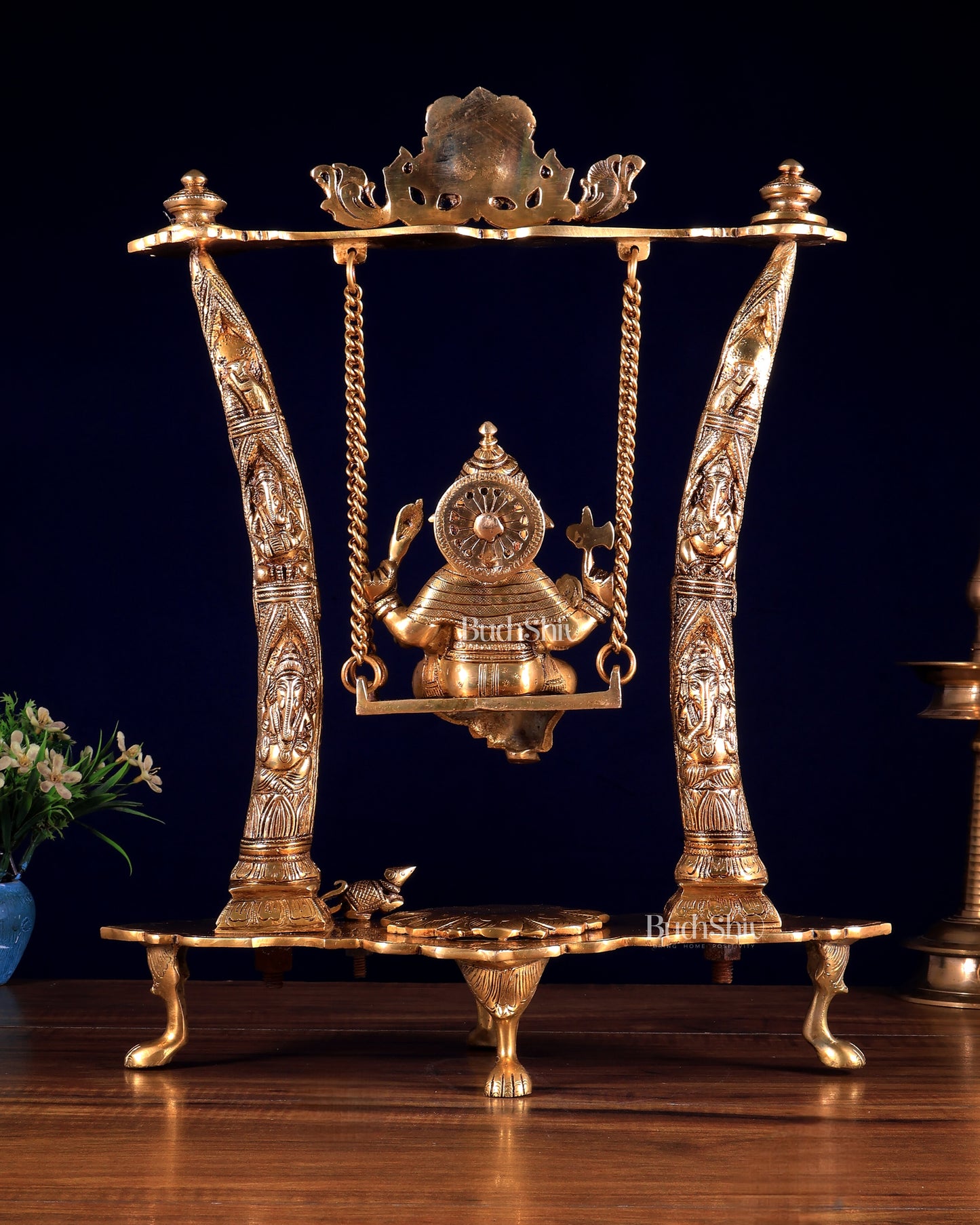 Brass Ganesha Idol on Swing with Pillars Decorated with Ganesha Figures 17 inch