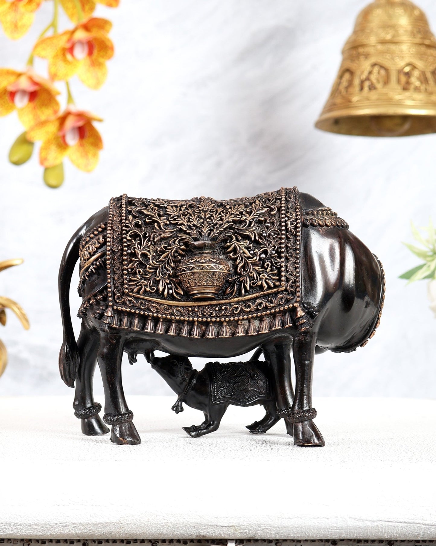 Brass Kamdhenu Cow with Calf Idol | Auspicious Cow & Calf Statue with Kalash Carvings 6.5" black finish - Budhshiv.com
