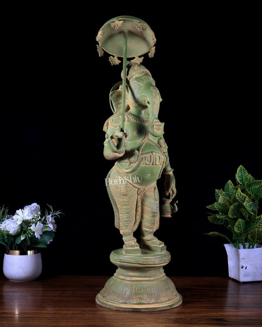 Brass Standing Ganesha with Umbrella & Kamandal – Rare Depiction of Lord Ganapati 28 inch green patina tone - Budhshiv.com