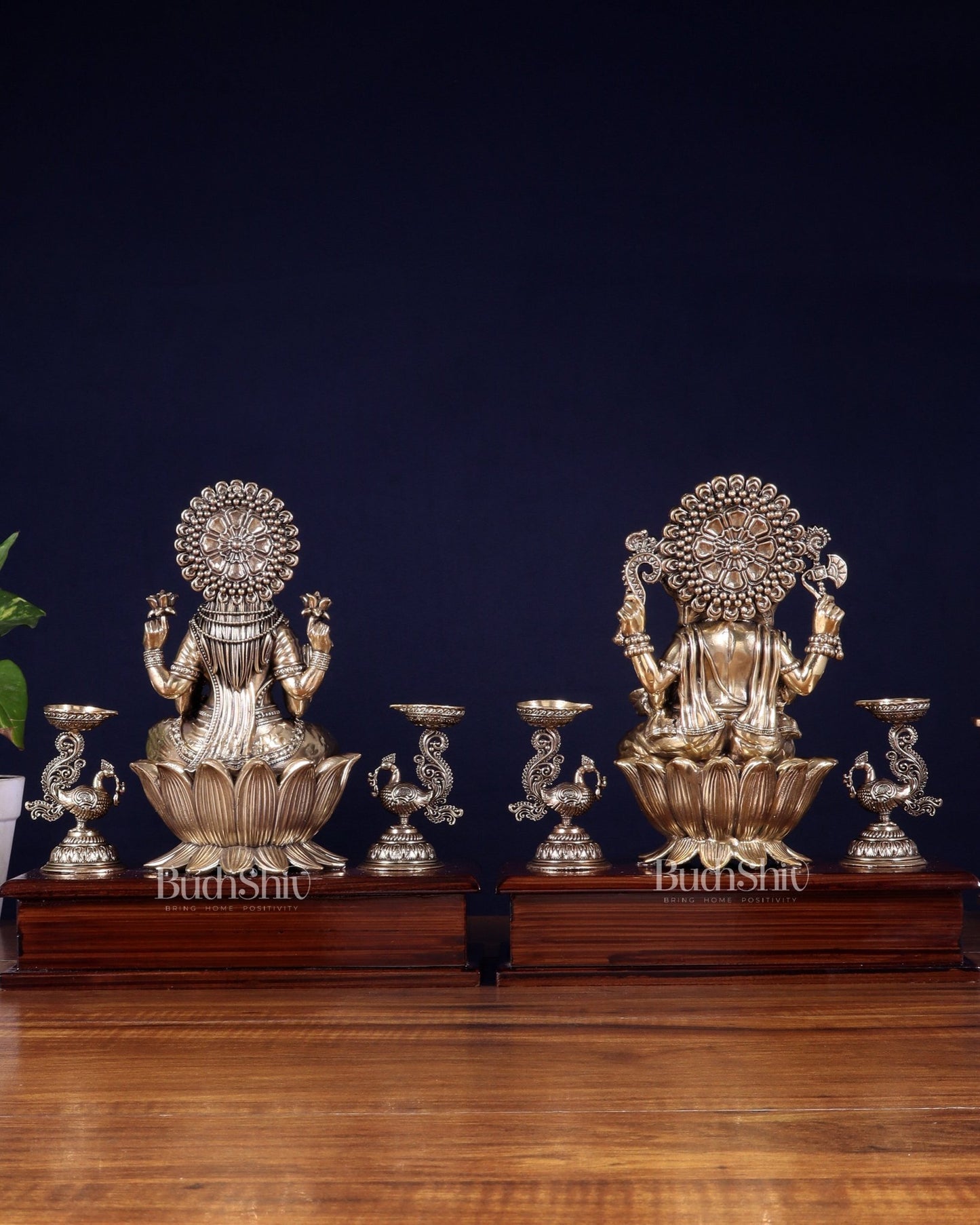 Brass Superfine Ganesh–Lakshmi Pair with Twin Peacock Lamps on Wooden Base – 9.5 Inch - Budhshiv.com