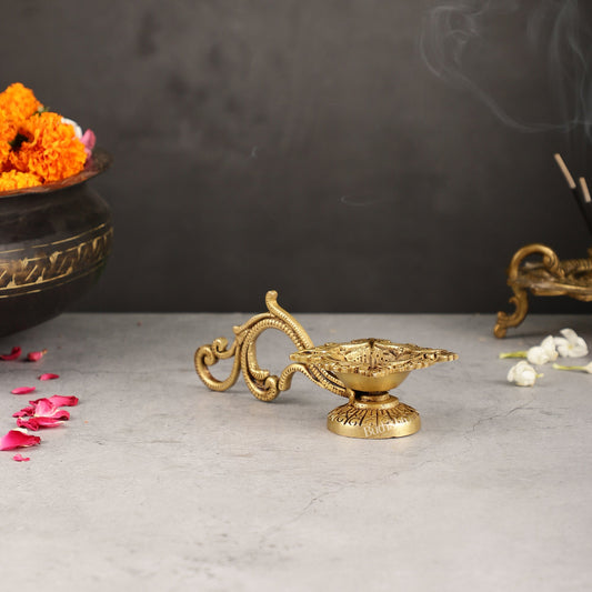Brass unique diya with handle - Budhshiv.com