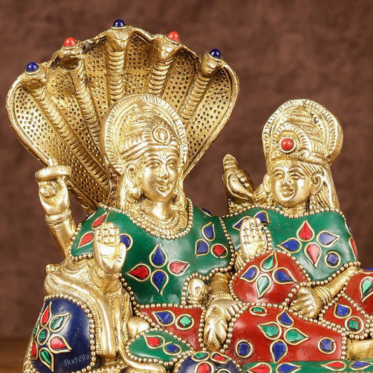 Lakshmi Narayan/ Vishnu Lakshmi brass idol resting on Sheshnaag Golden finish - Budhshiv.com
