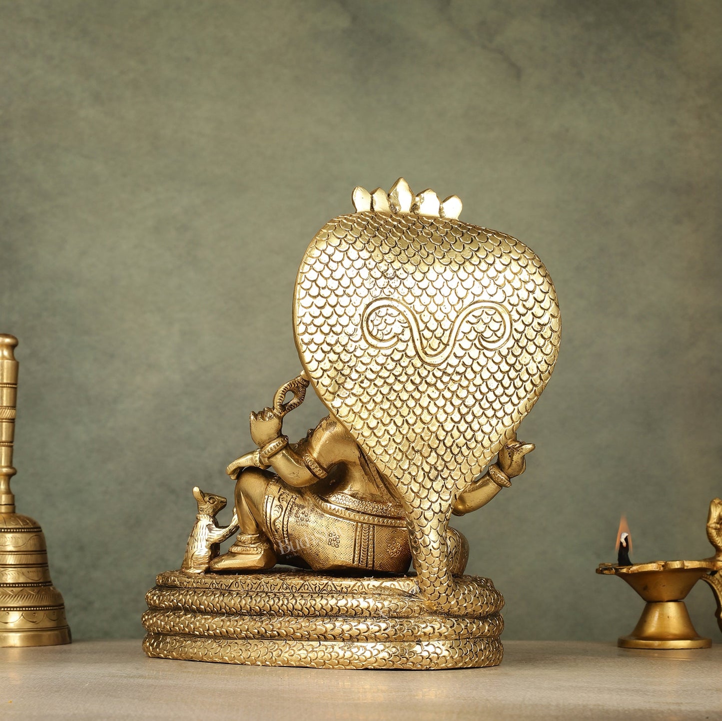 Pure Brass Lord Ganesha Resting on Sheshnaag – 10" x 9" x 5.5" | Divine & Artistic Idol - Budhshiv.com