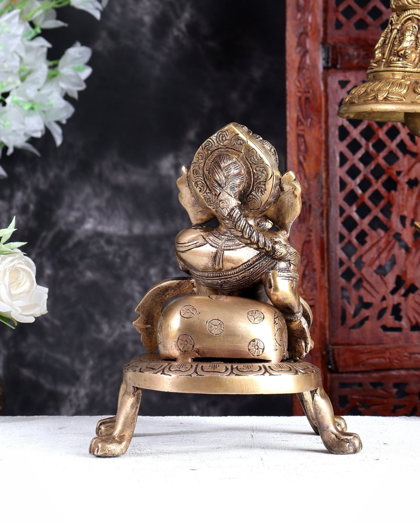 Unique Brass Resting Ganesha with Long Braided Hair – Handcrafted Masterpiece - Budhshiv.com