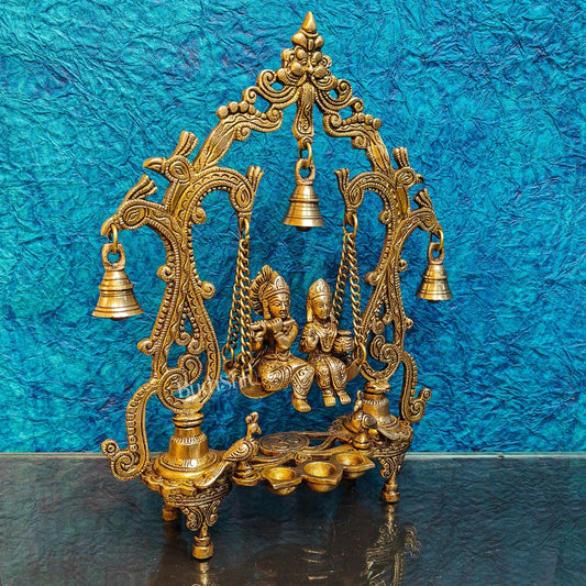 Brass Radha Krishna Swing with Three Diyas 13.5 inch - Budhshiv.com