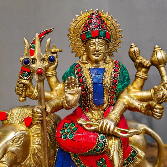 Goddess Durga brass idol with 8 arms sitting on lion with stonework 9 inches - Budhshiv.com
