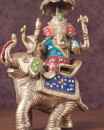 Lord Ganesha sitting on elephant meenakari brass statue