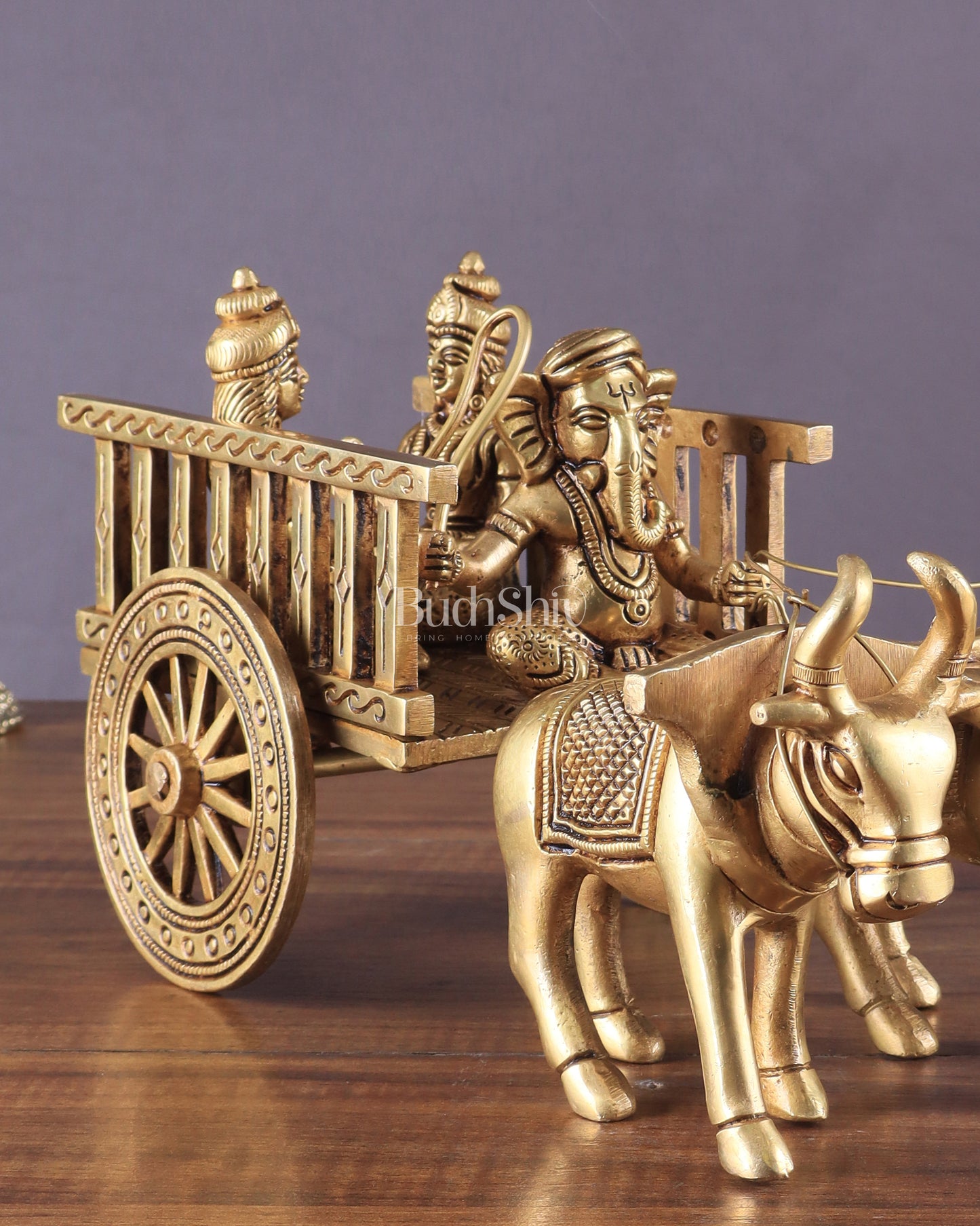 Brass Ganesha showpiece bullock cart with riddhi siddhi enhanced carvings