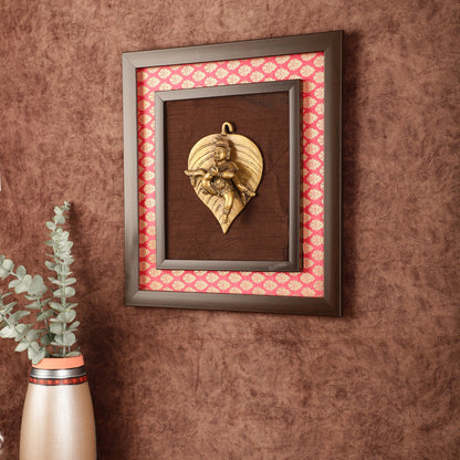 Brass Baby Krishna Baal Gopal Resting on a Leaf Hanging on Wooden Frame with Premium Fabric - 13" x 14"