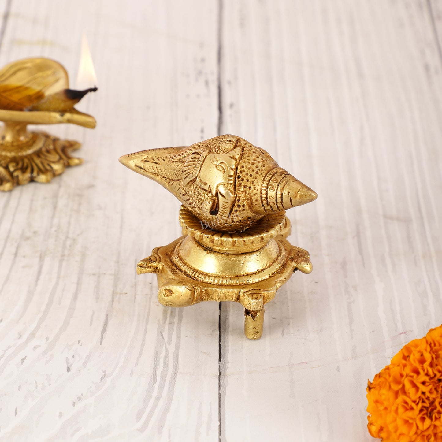 Brass small ganesha shankh on tortoise stand