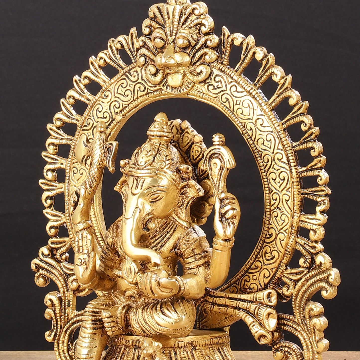 Superfine 9-Inch Brass Lord Ganesha Statue with Arch Prabhavali