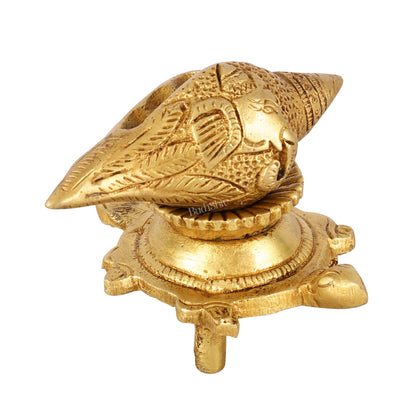 Brass small ganesha shankh on tortoise stand