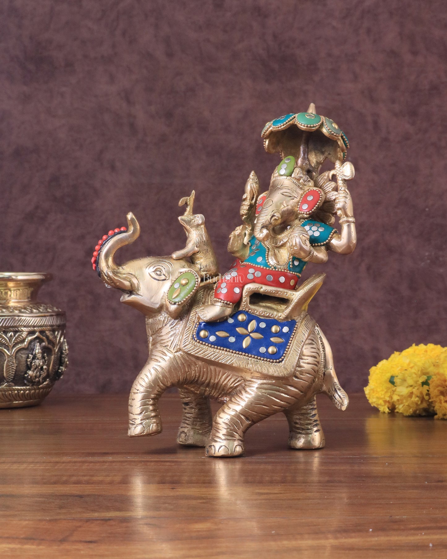 Lord Ganesha sitting on elephant meenakari brass statue