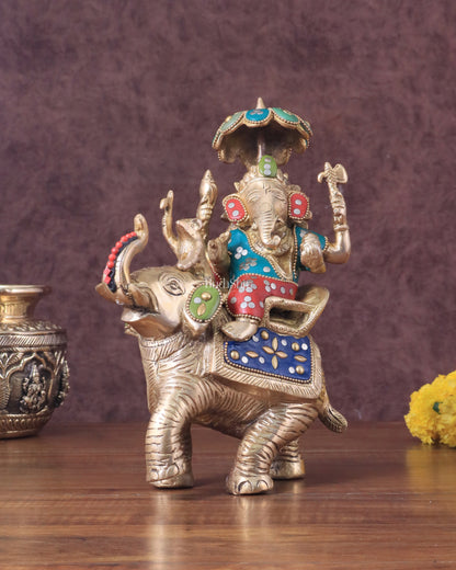 Lord Ganesha sitting on elephant meenakari brass statue