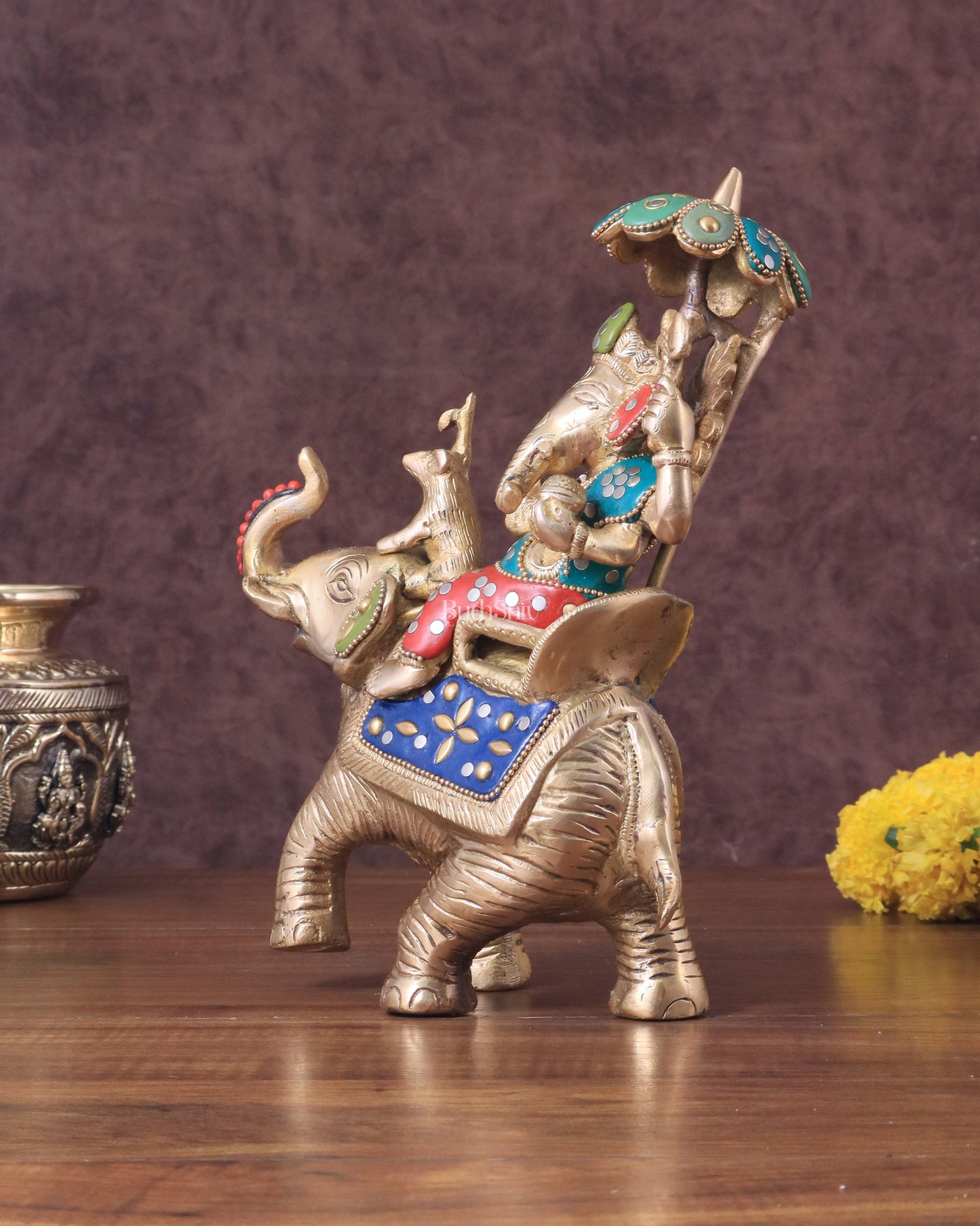 Lord Ganesha sitting on elephant meenakari brass statue