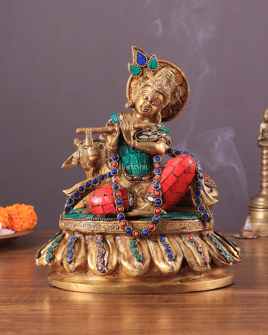 krishna seated with a cow on round base 7.5"