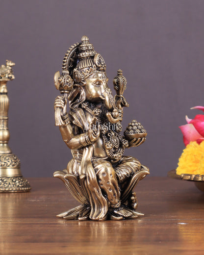 Brass Ganesha Idol Seated on Lotus 4 inch right side trunk