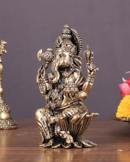 Brass Ganesha Idol Seated on Lotus 4 inch right side trunk