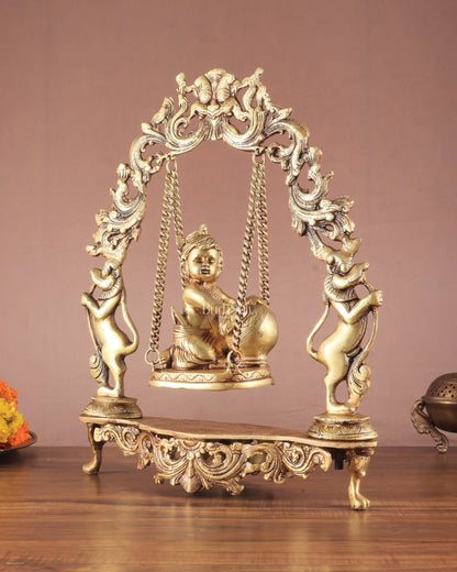 Pure Brass Baby Krishna as Bal Gopal Makhan Chor on an Elegant Kirtimukha Swing 18"