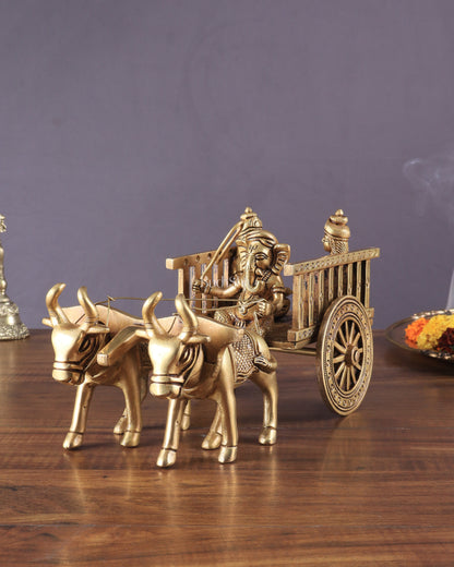 Brass Ganesha showpiece bullock cart with riddhi siddhi enhanced carvings