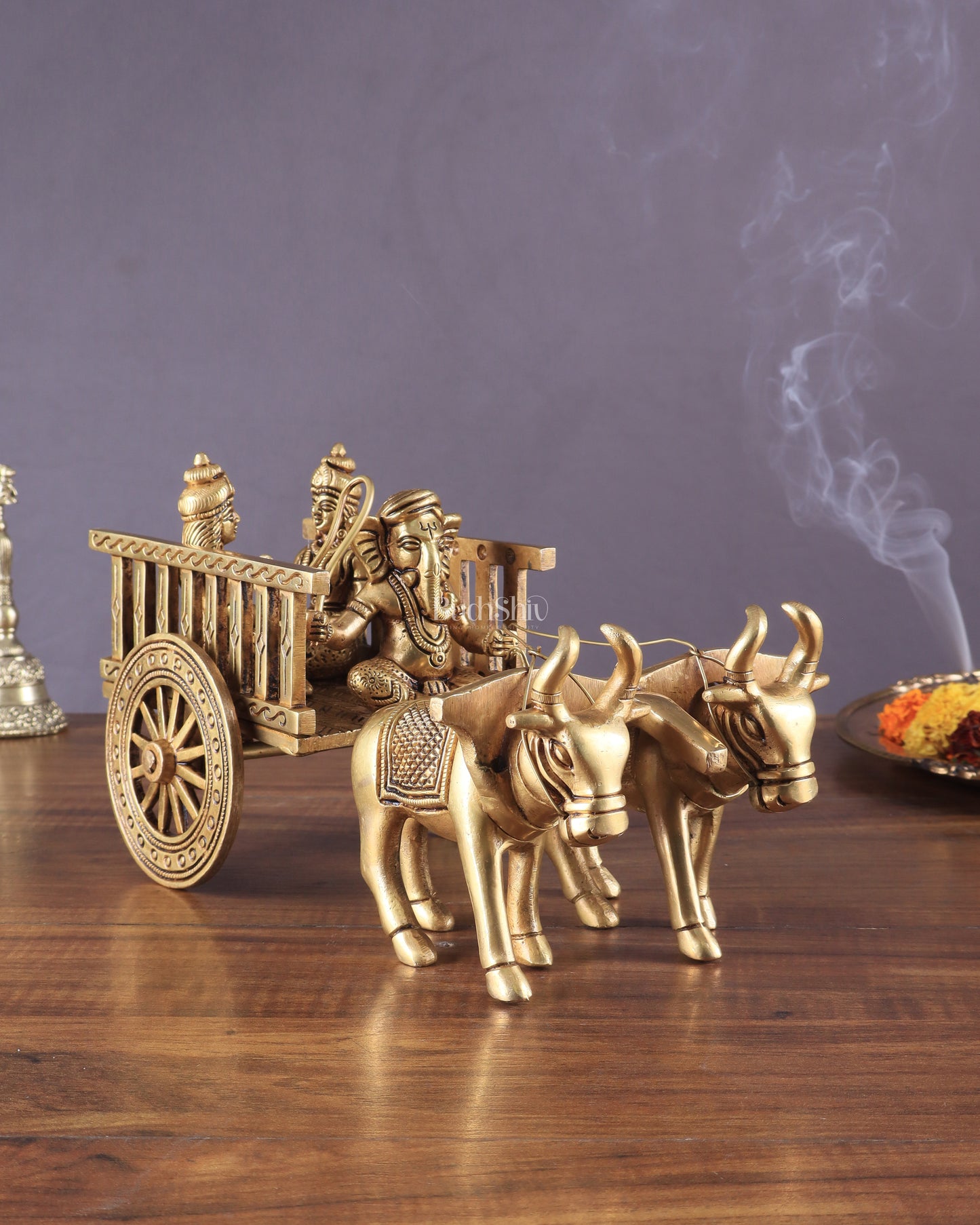 Brass Ganesha showpiece bullock cart with riddhi siddhi enhanced carvings