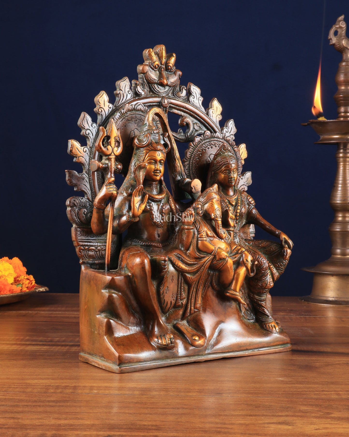 Pure Brass Lord Shiv Parvati with Ganesha Idol and Prabhavali 10.7 inch brown gold