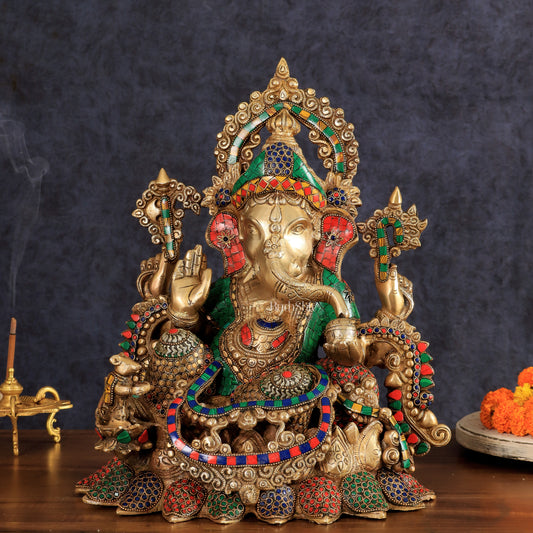 Brass Ganapati statue with sharp features - 16 inches