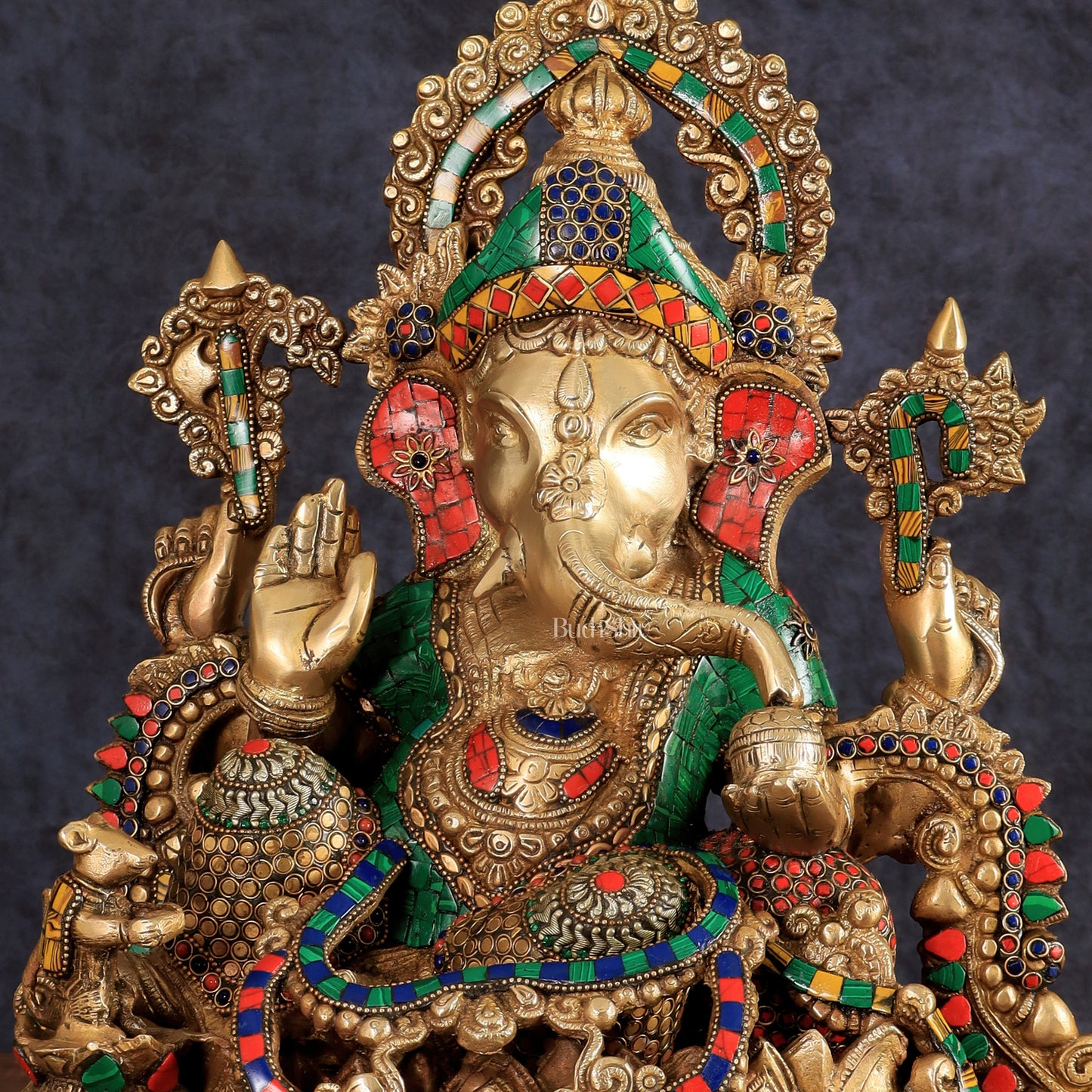 Brass Ganapati statue with sharp features - 16 inches