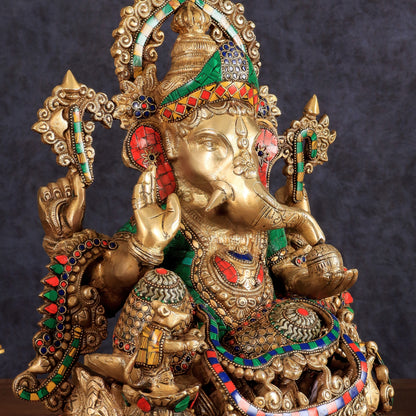 Brass Ganapati statue with sharp features - 16 inches