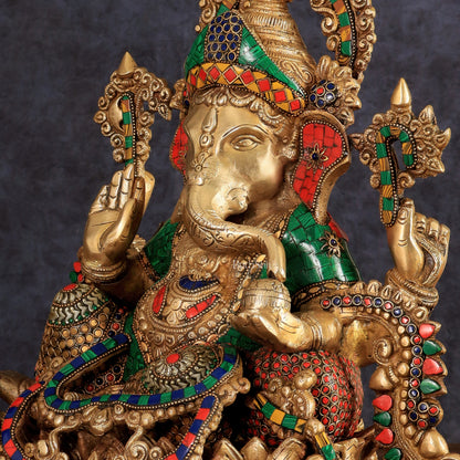 Brass Ganapati statue with sharp features - 16 inches