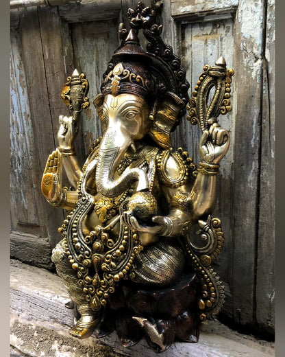 Ganesha Brass Idol 21 inches high seated on a lotus base