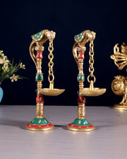 Brass Parrot lamps with stonework 7"