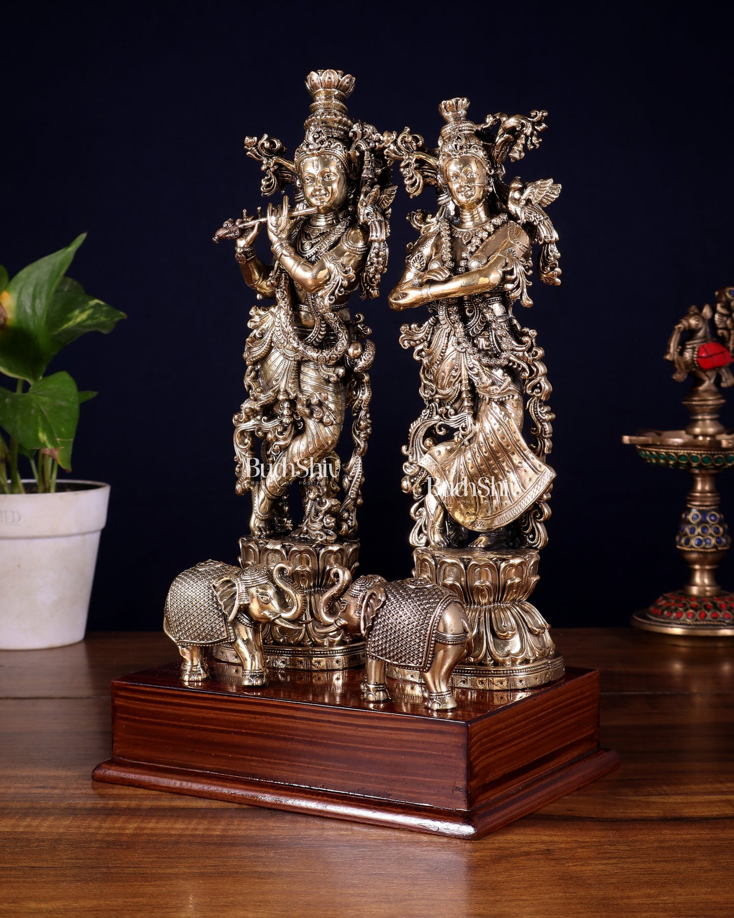 Brass Radha Krishna with Elephants on Wooden Base – Superfine Finish 11.5 inch