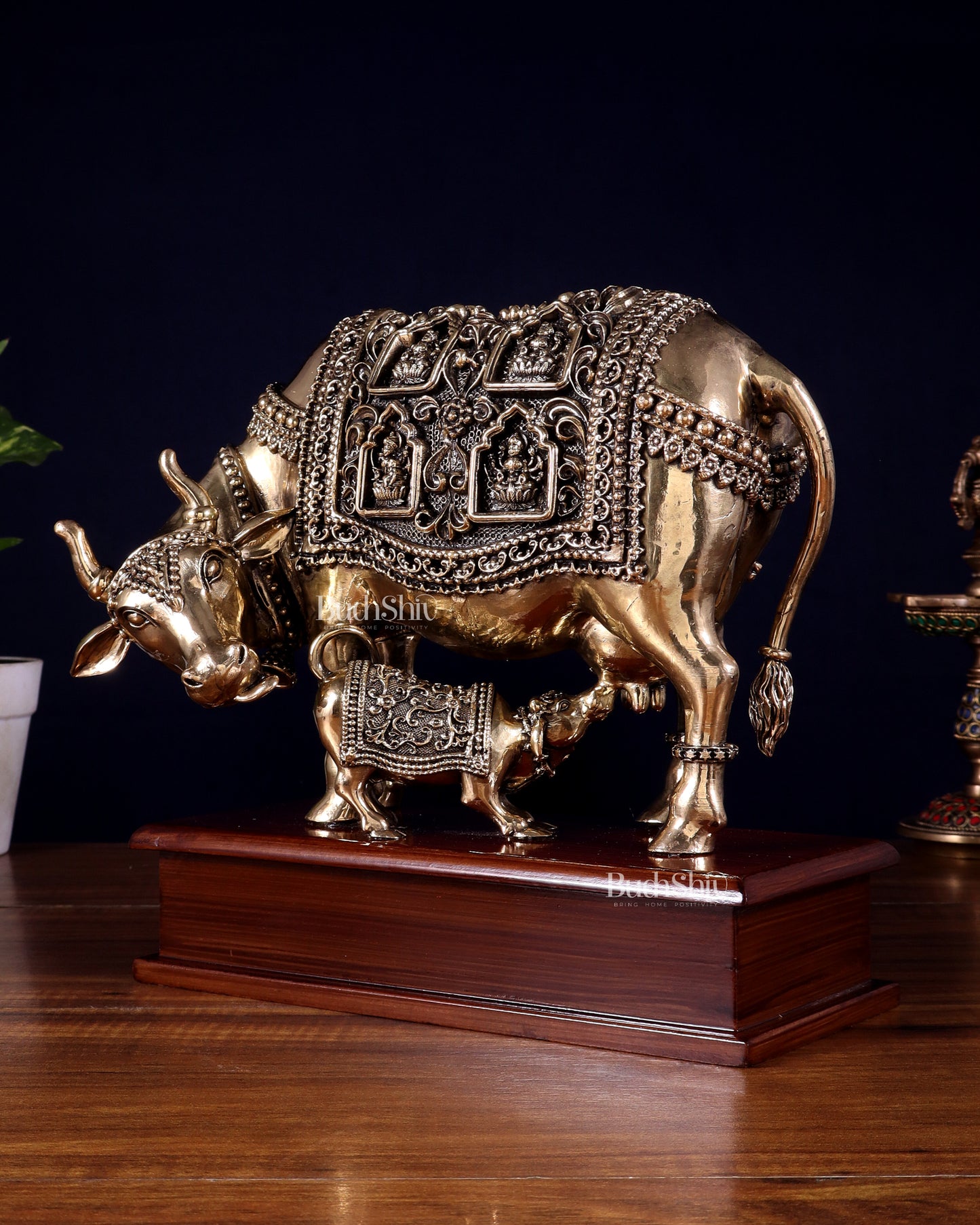 Brass Superfine Kamdhenu Cow with Calf with ashtalakshmi carvings on Wooden Base – 9.5 Inch