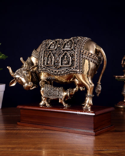Brass Superfine Kamdhenu Cow with Calf with ashtalakshmi carvings on Wooden Base – 9.5 Inch