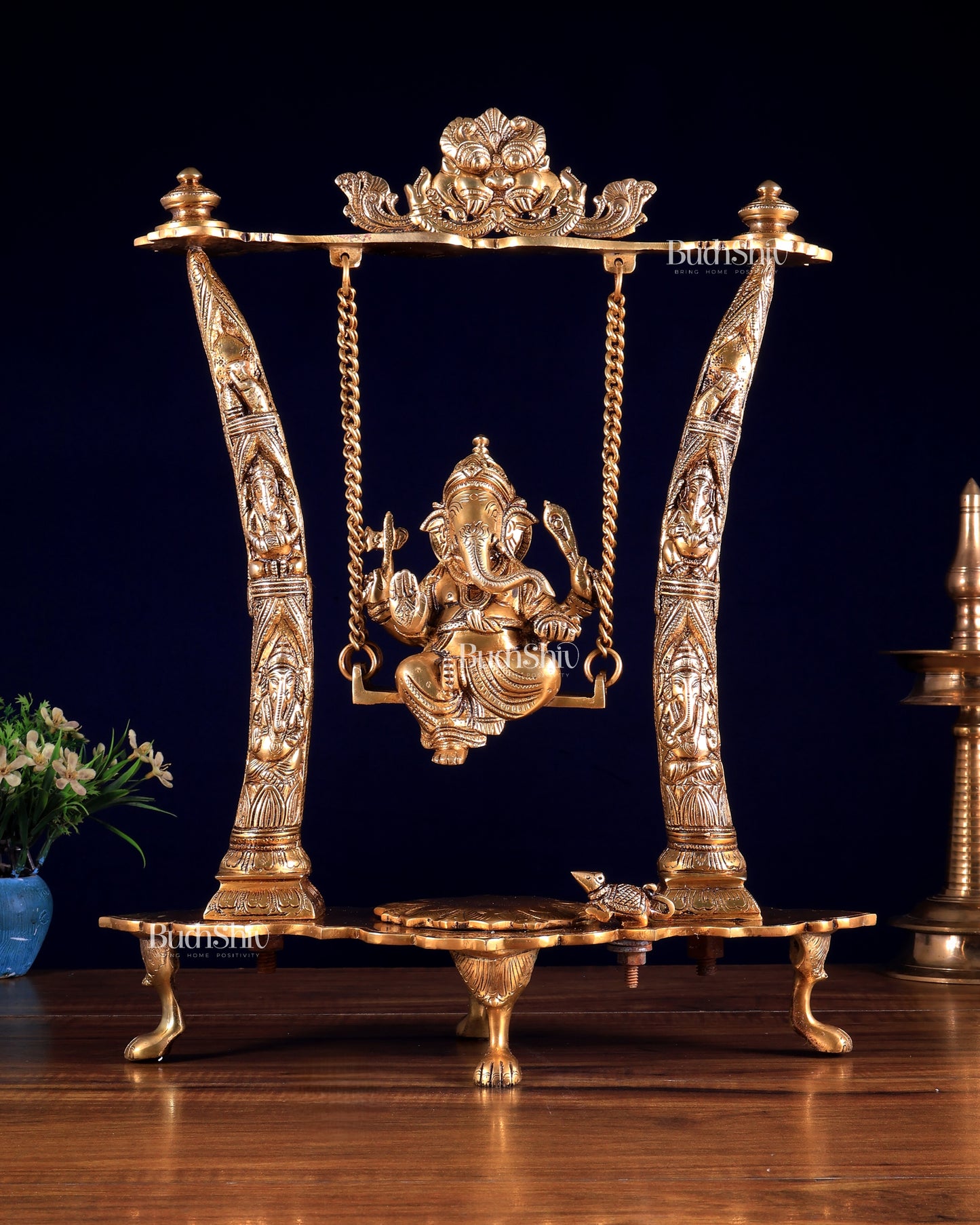 Brass Ganesha Idol on Swing with Pillars Decorated with Ganesha Figures 17 inch