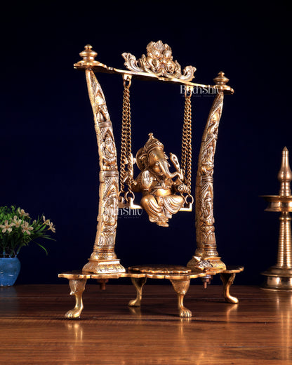 Brass Ganesha Idol on Swing with Pillars Decorated with Ganesha Figures 17 inch