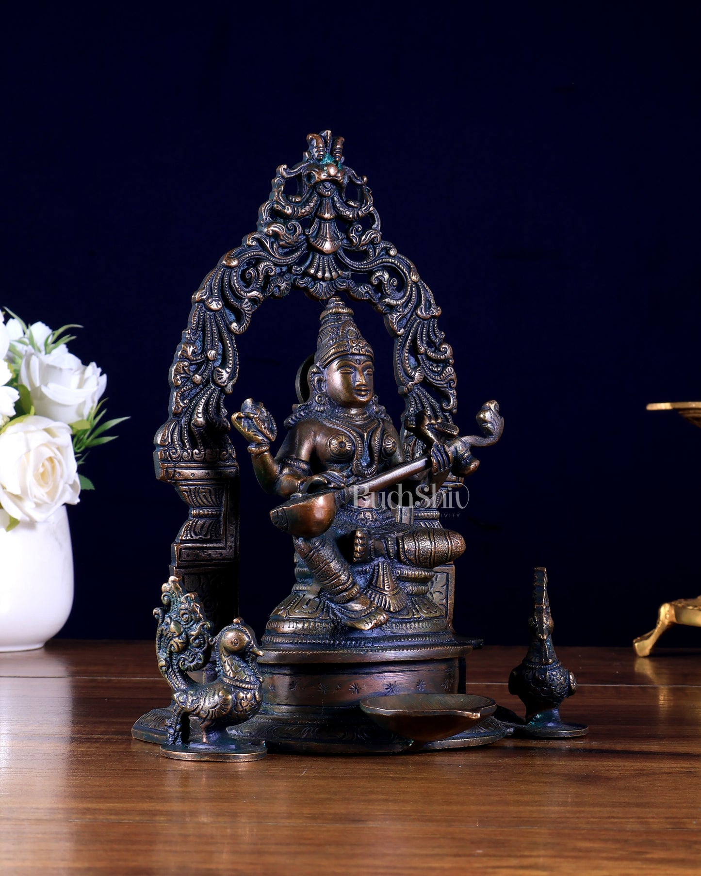 Brass Goddess Saraswati with attached diya and Prabhavali idol