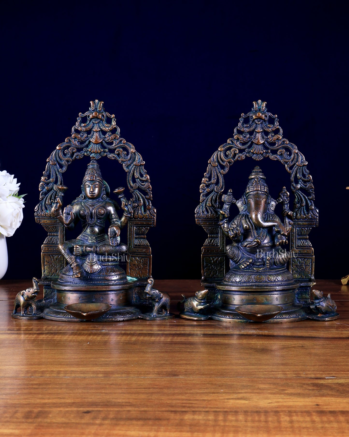 Brass Ganesha–Lakshmi Pair with Attached Diya & Prabhavali