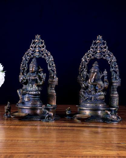 Brass Ganesha–Lakshmi Pair with Attached Diya & Prabhavali