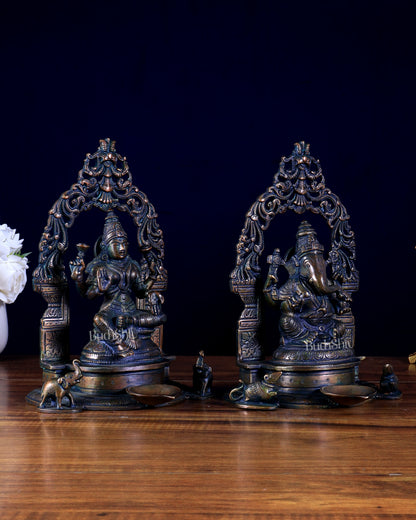 Brass Ganesha–Lakshmi Pair with Attached Diya & Prabhavali