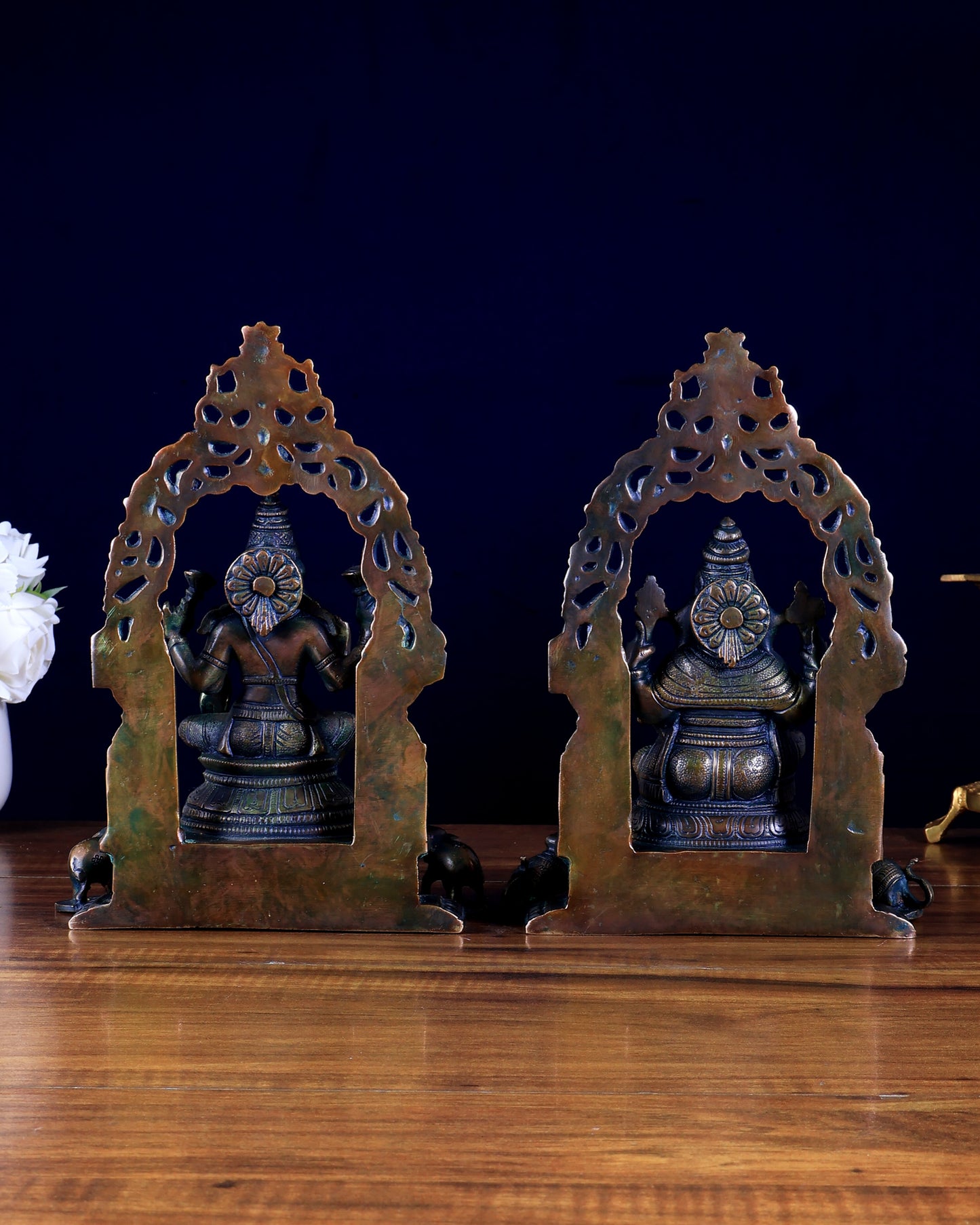 Brass Ganesha–Lakshmi Pair with Attached Diya & Prabhavali