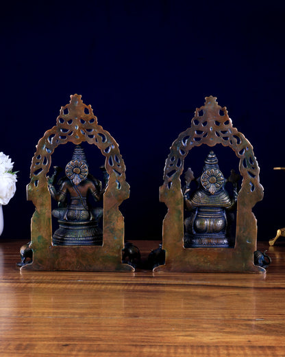 Brass Ganesha–Lakshmi Pair with Attached Diya & Prabhavali