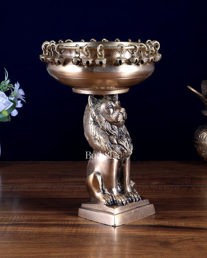 Brass Sitting Lion with Urli – Decorative & Auspicious Artefact 9.5 inch