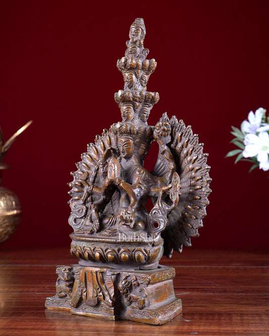 Brass Seated Avalokiteshvara with Many Heads and Hands 9 inch rustic copper tone