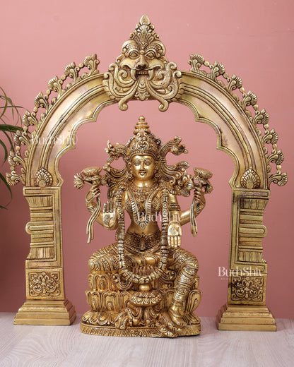 Majestic Brass Goddess Lakshmi Idol with Kirtimukha Prabhavali Arch Aureole | Superfine Temple Decor Set (21.5 Inch Frame)