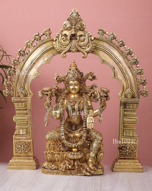 Majestic Brass Goddess Lakshmi Idol with Kirtimukha Prabhavali Arch Aureole | Superfine Temple Decor Set (21.5 Inch Frame)