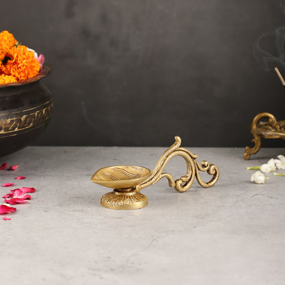 Brass leaf aarti diya with handle